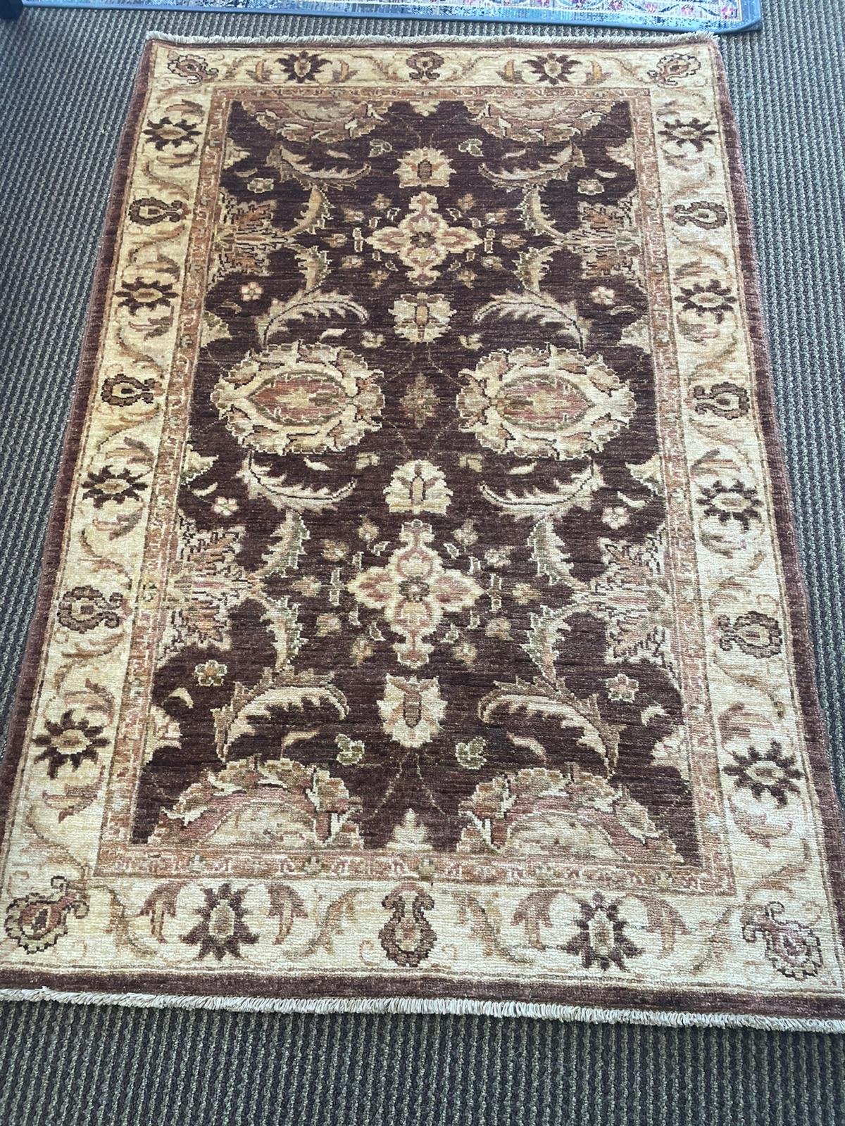 ONE-OF-A-KIND HANDMADE WOOL AREA RUG